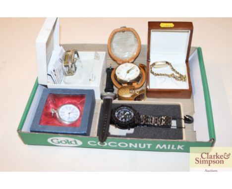 Five various watches, travelling clock, and a ladies Omega watch 