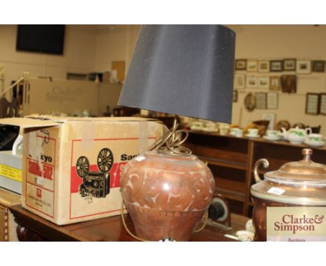 A terracotta pottery table lamp and shade 