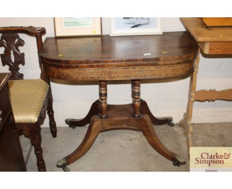 A 19th Century mahogany and rosewood cross banded card table  