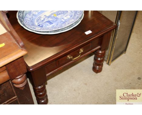 A mahogany lamp table fitted single drawer