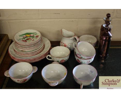 A quantity of St Clemiut pottery dinnerware and a pair of Worcester oil bottles 