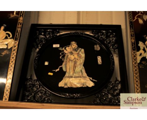 An Oriental pierced and mother of pearl decorated wall panel