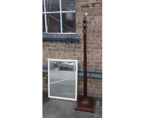 AN ART DECO MAHOGANY STANDARD LAMP of square tapering form with gilt jazz-modern motifs and Greek key border to the base, and