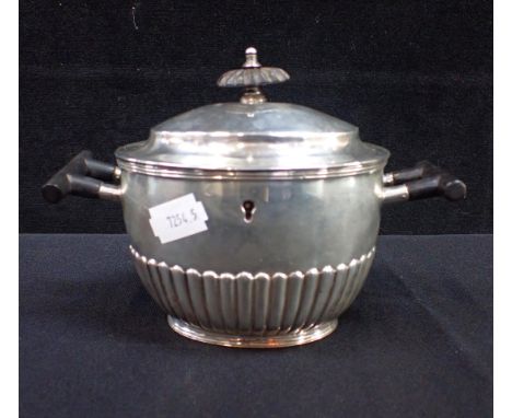 A SILVER TEA CADDY with lock, late 19th century, marks rubbed