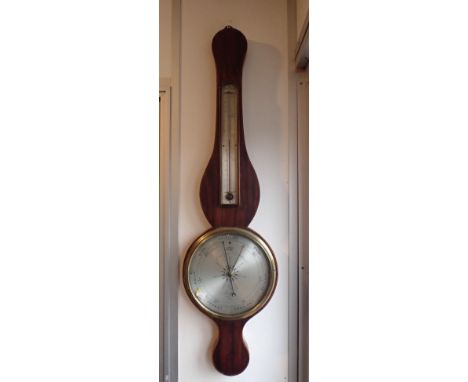 A GEORGE III MAHOGANY CASED WHEEL BAROMETER with silvered dial; James Gatty, 132 Holborn, London