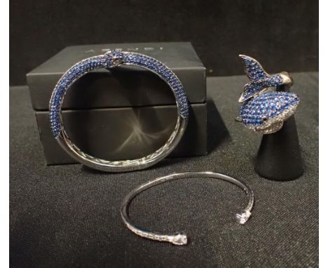 A 925 SILVER SERPENT BANGLE pave set with blue and clear paste, a similar shark pattern ring and a 925 silver paste set bangl
