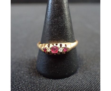 A GOLD, RUBY AND DIAMOND RING (indistinct marks)