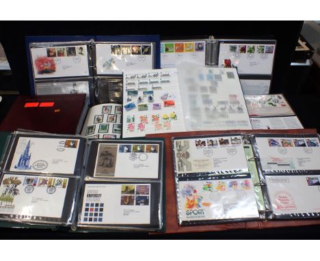 A QUANTITY OF FIRST DAY COVERS (8) and two albums of stamps