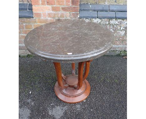 A FRENCH ART DECO STYLE OCCASIONAL TABLE with marbled composition top on scrolling legs, reproduction 72cm dia (a/f)