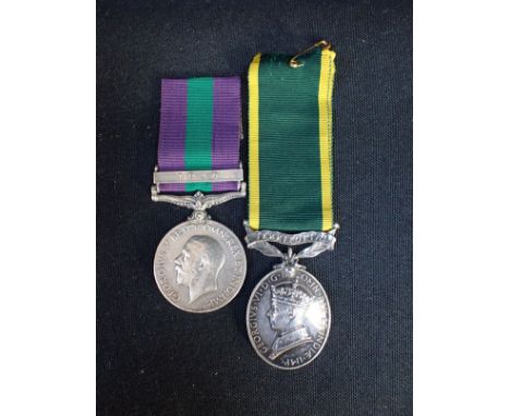 TWO BRITISH MEDALS GV GSM Iraq - 2276 Pte G Warren Manch R. Condition NVF (contacting and naming worn in places). GVI TEM - 8