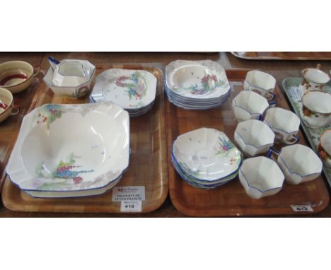 Two trays of Shelley china tea ware items registration number 723404 on a white ground with geometric handles and enameled fl