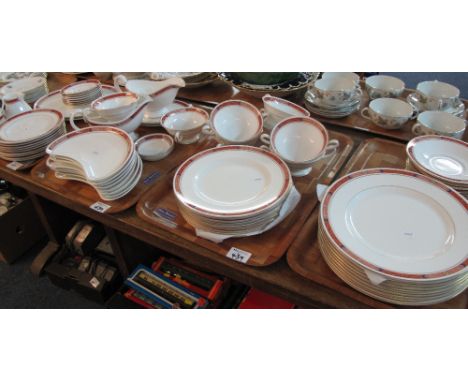 Five trays of Royal Worcester fine bone china dinner ware items on a white ground with gilt banding and foliate decoration co