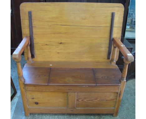 Late 19th Century pitch pine monk's bench with open arms on stile feet.