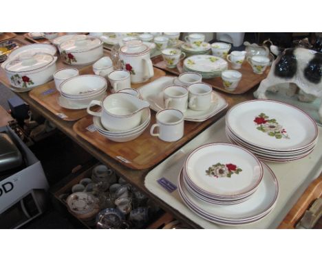 Four trays of J and G Meakin studio pottery tea and dinner ware items on a cream ground with rose and other floral decoration