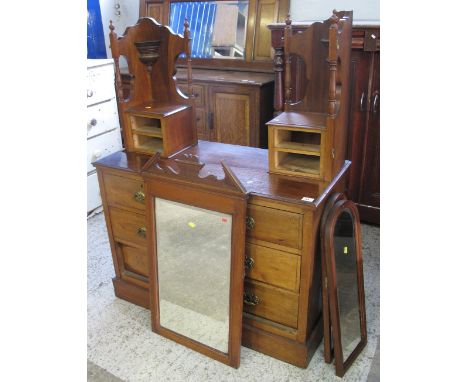 Edwardian mahogany mirror back dressing table chest of three drawers on a platform base.