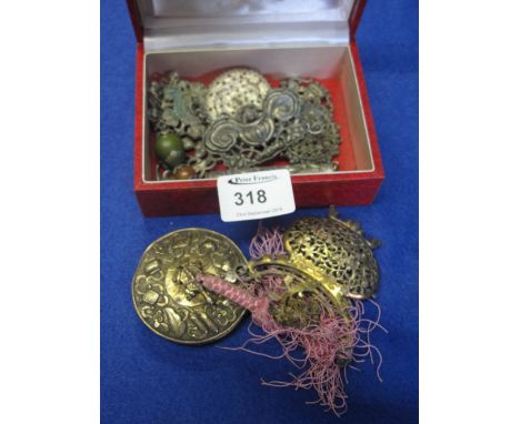Mondia box containing assorted white metal and gilt pierced items to include badges, pendants, mirror decorated with animals,