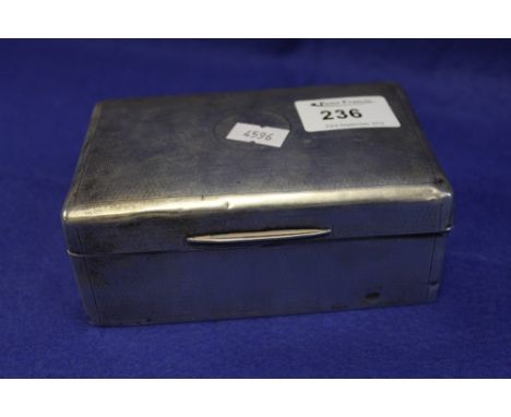 Silver engine turned rectangular cigarette box. London hall marks. 