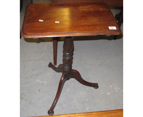 Small rectangular mahogany snap top tripod table.