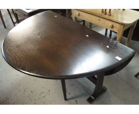 Mid 20th Century stained gate legged table.