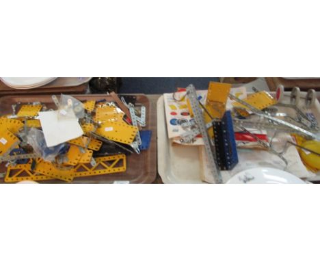 Two trays of assorted Meccano parts, Meccano instruction manual etc.  (2)