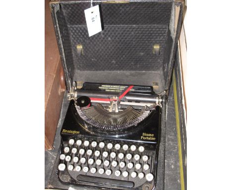 Vintage Remington home portable typewriter in carrying case.