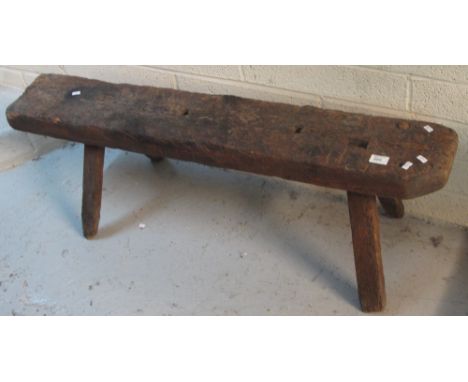 Rustic rectangular pig's bench.