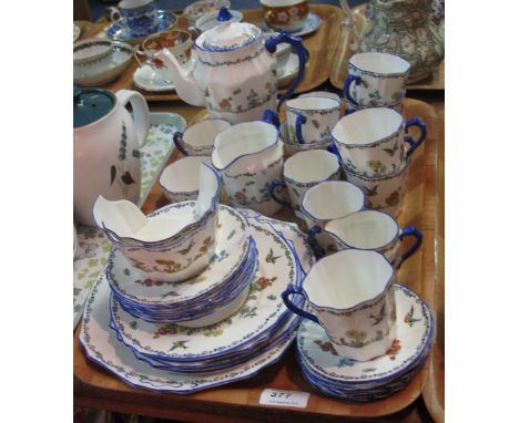 Collingwood bone china part tea ware items on a white ground with swallow, butterfly and floral decoration comprising various