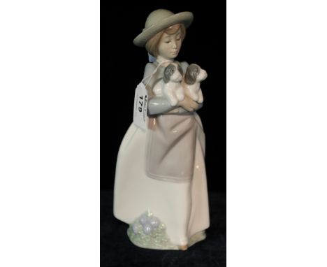 Nao porcelain figurine of lady with puppies.