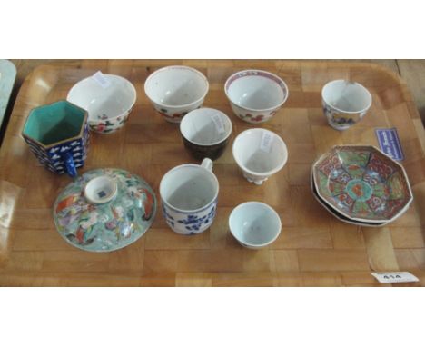 A group of small Chinese porcelain items including tea bowls, saucers and a single cup.
***  CONDITION REPORT: Condition repo