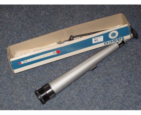 Small Tasco model 22T telescope with tripod in original box.