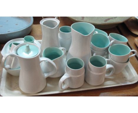 Tray of Poole pottery turquoise and cream part tea ware and other items to include cups, conical jug, gravy boat and stand, w