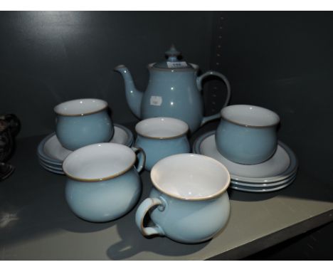 A tea service by Denby in powder blue