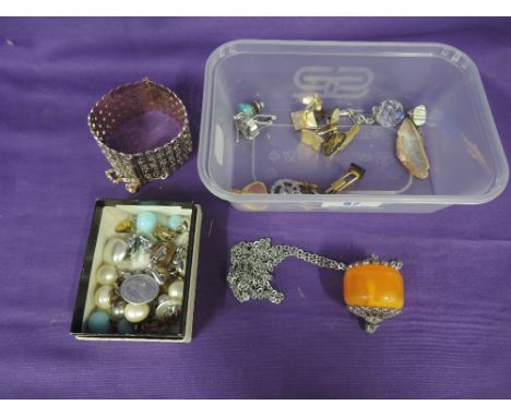 A small selection of costume jewellery including clip earrings, bangle, pendant, cufflinks etc