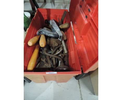 A selection of wood working and similar tools including planes and chisels