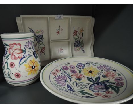 A selection of ceramics by Poole pottery