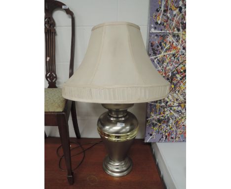 A modern table lamp and shade