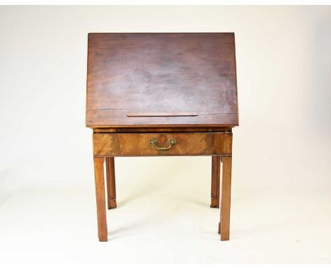 An early George III mahogany architect's table, the hinged, rectangular top with a retractable book ledge, which automaticall