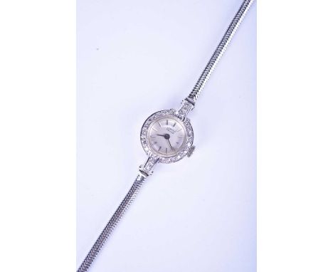 Vertex Revue: A lady's 18ct white gold diamond-set watchDate: Circa 1955Movement: 17-jewel, manual windDial: Brushed silver, 