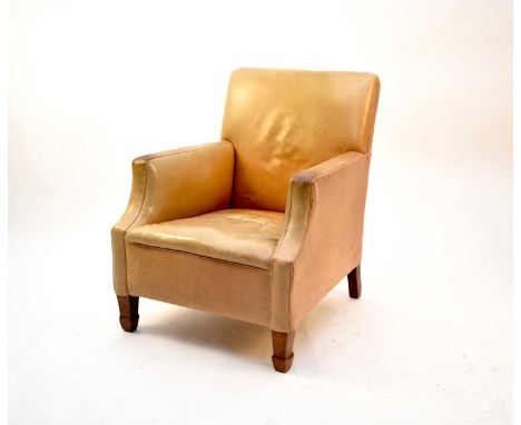 A maritime leather upholstered armchair, first half 20th century, of bergere shape raised on square section mahogany supports