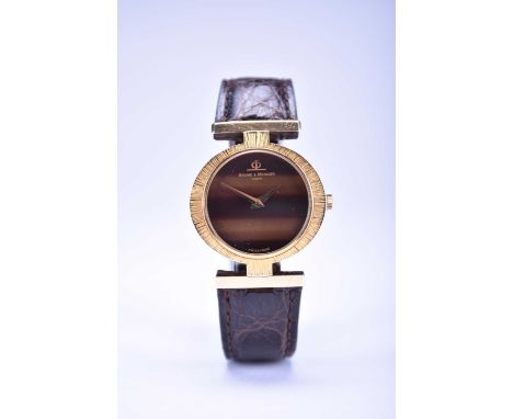 Baume &amp; Mercier: A lady's 18ct gold wristwatchModel: ClassicReference: 502134Date: Circa 1995Movement: Cal.777, 17 jewel,