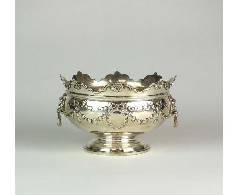 An Edwardian silver rose bowl of monteith form, Elkington &amp; Co Ltd, London 1902, with embossed swag and bow decoration wi
