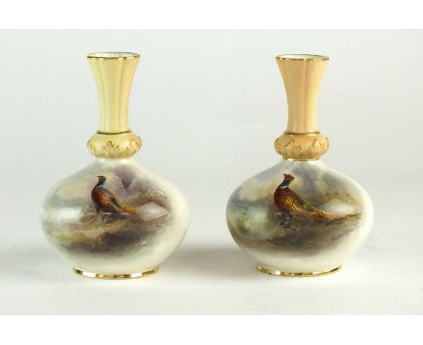 A near pair of Royal Worcester vases painted by James Stinton with pheasantsdated 1907 and 1908of globular form with flared n