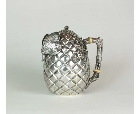 An unusual late 19th/early 20th century American silver teapot by Gorham, of stylised pineapple form with shell finial, 'butt