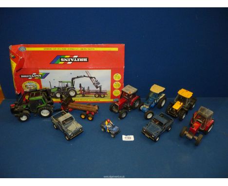 A quantity of Britains models mostly tractors including Valtra Valmet 115 Forest tractor and trailer with box (a/f.), two Lan