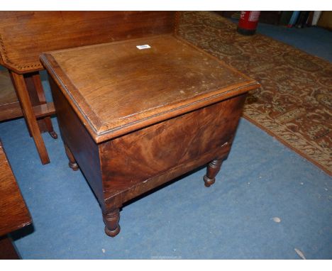 A Mahogany and other woods Box Commode standing on turned legs (unfurnished), 18'' x 15 3/8'' x 17 1/12'' high.