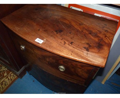 A bow fronted 19th c. Mahogany Commode having a shaped apron, interior incomplete, 24 3/4'' wide x 16'' deep x 28 3/8'' high.