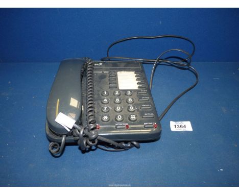 A BT Converse 200 two-piece Telephone in charcoal grey having push button dialing, amplify facility, shift store, recall, red