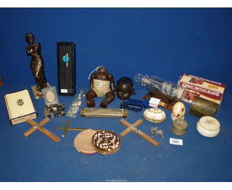 A quantity of small miscellanea including compact, crucifix, bible, ship in a bottle, stone trinket pots, small doll by 'Reli