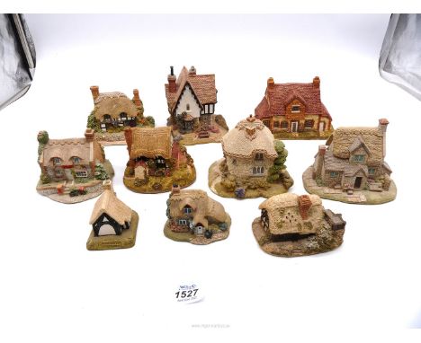 A quantity of Lilliput Lane houses including; Stone Cottage, Tanglewood Lodge, Mrs Pinkertons Post Office, Penny Sweets, etc.