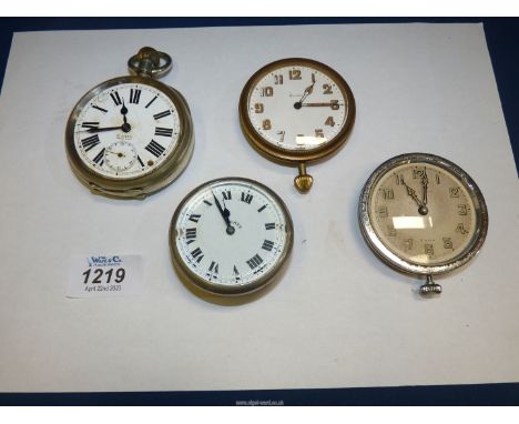 Three travelling clock movements, two having Arabic numerals and one with Roman numerals and a large crown-wound white metal 